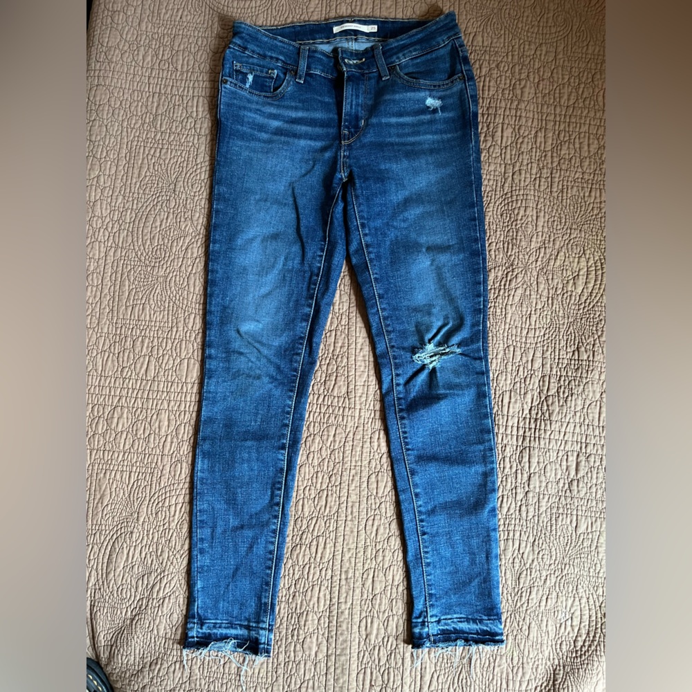 Levi’s 711 skinny ankle with raw hem size 25